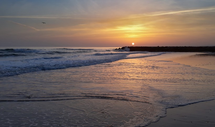 海平线上升起落下的太阳·唯美日出日落风景图片第8张